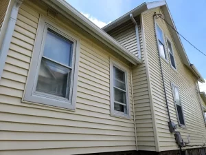 beige house with electrical box