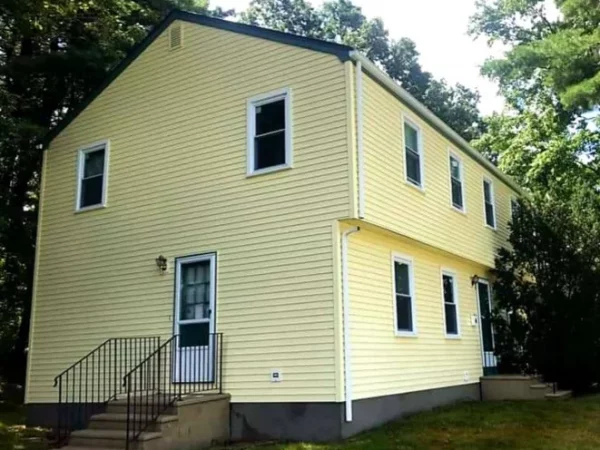 house wash 1 yellow house with trees